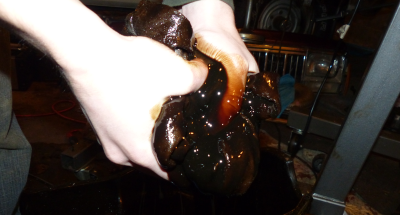 Illustration for article titled Dyeing Clothes With Used Motor Oil Is The Best And Worst Solution To Your Stain Problem